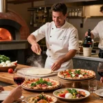 Chef preparing authentic pizza and antipasti at Pizzeria Madera, showcasing pg soft culinary excellence.